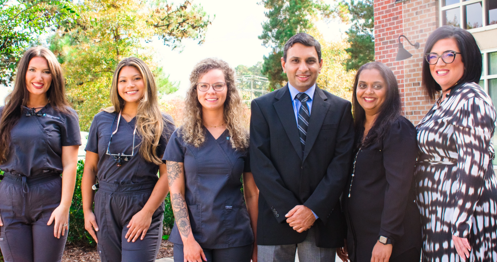 Dr. Akash Aghera and the BridgeHampton Dental team outside the office in Ballantyne, NC